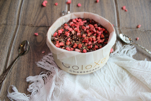 Chocolate Cheesecake with Toppings : raspberry gel , freeze-dried raspberry, cocoa nibs and cocoa pearls.